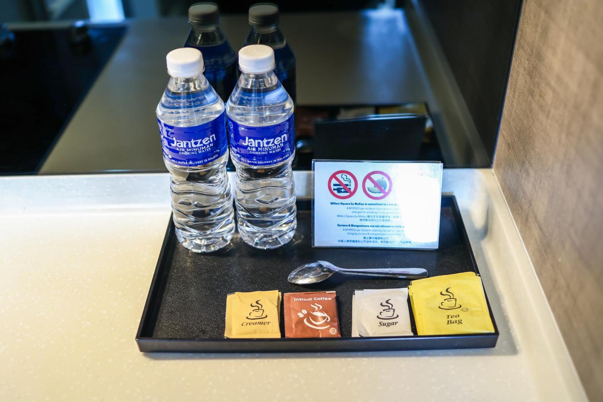 Millerz Square By Mykey Lejlighed Kuala Lumpur Eksteriør billede Bottled water and tea bags in a hotel room